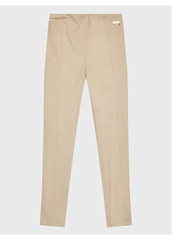 Guess Legginsy J1BB14 WE0L0 Beżowy Slim Fit ze sklepu MODIVO w kategorii Spodnie dziewczęce - zdjęcie 168423282