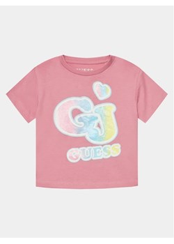 Guess T-Shirt K4RI28 K8HM0 Różowy Boxy Fit ze sklepu MODIVO w kategorii Bluzki dziewczęce - zdjęcie 168432562