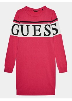 Guess Sukienka dzianinowa J3BK16 Z38B0 Różowy Regular Fit ze sklepu MODIVO w kategorii Sukienki dziewczęce - zdjęcie 168444860