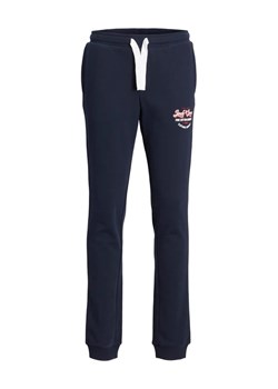 Jack&Jones Junior Spodnie materiałowe 12225212 Granatowy Regular Fit ze sklepu MODIVO w kategorii Spodnie chłopięce - zdjęcie 168447472