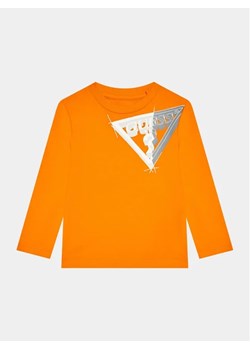 Guess Bluzka N3BI14 I3Z13 Pomarańczowy Regular Fit ze sklepu MODIVO w kategorii T-shirty chłopięce - zdjęcie 168449034