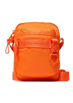 Calvin Klein Jeans Saszetka Ultralight Reporter 18 Nylon K50K509817 Pomarańczowy ze sklepu MODIVO w kategorii Saszetki - zdjęcie 168456854