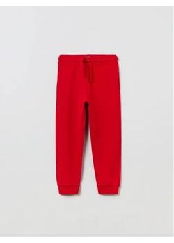 OVS Spodnie dresowe 1833896 Czerwony Regular Fit ze sklepu MODIVO w kategorii Spodnie chłopięce - zdjęcie 168457521
