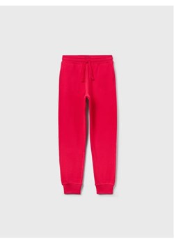 OVS Spodnie dresowe 1593222 Różowy Regular Fit ze sklepu MODIVO w kategorii Spodnie chłopięce - zdjęcie 168466491
