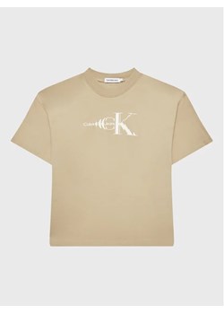 Calvin Klein Jeans T-Shirt Natural Dye Monogram IB0IB01532 Beżowy Relaxed Fit ze sklepu MODIVO w kategorii T-shirty chłopięce - zdjęcie 168472750