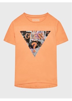 Guess T-Shirt J3RI32 K6YW1 Pomarańczowy Regular Fit ze sklepu MODIVO w kategorii T-shirty chłopięce - zdjęcie 168474521