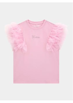 Guess T-Shirt J4RI34 K6YW1 Różowy Regular Fit ze sklepu MODIVO w kategorii Bluzki dziewczęce - zdjęcie 168476373