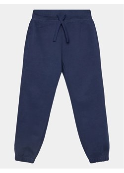 United Colors Of Benetton Spodnie dresowe 3EB5CF048 Granatowy Regular Fit ze sklepu MODIVO w kategorii Spodnie chłopięce - zdjęcie 168479420