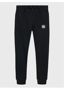 Ellesse Spodnie dresowe Eventa Jnr S3P16425 Czarny Regular Fit ze sklepu MODIVO w kategorii Spodnie chłopięce - zdjęcie 168485392