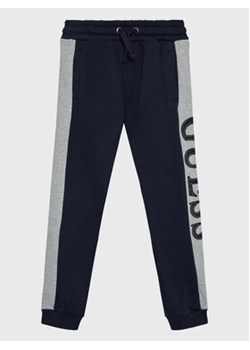 Guess Spodnie dresowe L3RQ24 KA6R3 Granatowy Regular Fit ze sklepu MODIVO w kategorii Spodnie chłopięce - zdjęcie 168505443