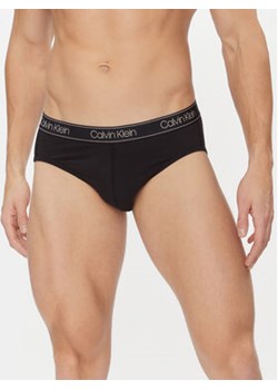 Calvin Klein Underwear Slipy 000NB2863A Czarny Regular Fit ze sklepu MODIVO w kategorii Majtki męskie - zdjęcie 168507221