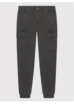 Guess Joggery L1YB09 WE1L0 Szary Regular Fit ze sklepu MODIVO w kategorii Spodnie chłopięce - zdjęcie 168507553