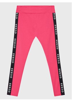 Guess Legginsy J2YB09 KABR0 Różowy Slim Fit ze sklepu MODIVO w kategorii Spodnie dziewczęce - zdjęcie 168511800