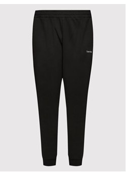 Calvin Klein Curve Spodnie dresowe Inclusive Micro Logo K20K204884 Czarny Regular Fit ze sklepu MODIVO w kategorii Spodnie damskie - zdjęcie 168511891