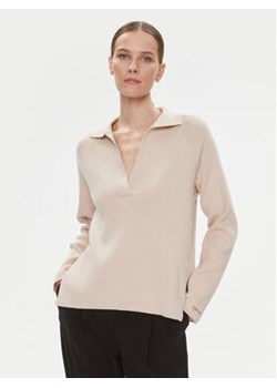Calvin Klein Sweter Essential K20K206019 Beżowy Relaxed Fit ze sklepu MODIVO w kategorii Swetry damskie - zdjęcie 168512321