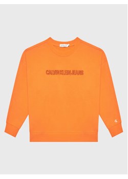 Calvin Klein Jeans Bluza Raised Embro IB0IB01670 Pomarańczowy Regular Fit ze sklepu MODIVO w kategorii Bluzy chłopięce - zdjęcie 168515343