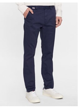 Tommy Jeans Chinosy DM0DM16758 Granatowy Slim Fit ze sklepu MODIVO w kategorii Spodnie męskie - zdjęcie 168515902