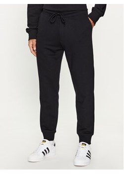 United Colors Of Benetton Spodnie dresowe 3J68UF00K Czarny Regular Fit ze sklepu MODIVO w kategorii Spodnie męskie - zdjęcie 168518704