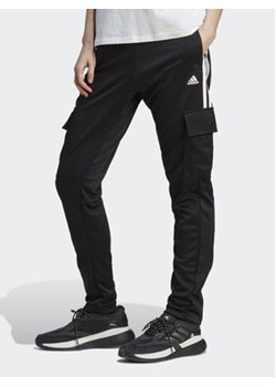 adidas Spodnie dresowe Tiro Cargo IA3034 Czarny Regular Fit ze sklepu MODIVO w kategorii Spodnie męskie - zdjęcie 168519751