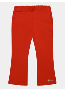 Guess Spodnie materiałowe K3BQ12 KAD74 Czerwony Relaxed Fit ze sklepu MODIVO w kategorii Spodnie dziewczęce - zdjęcie 168521002