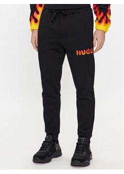Hugo Spodnie dresowe Drada 50504788 Czarny Regular Fit ze sklepu MODIVO w kategorii Spodnie męskie - zdjęcie 168521091