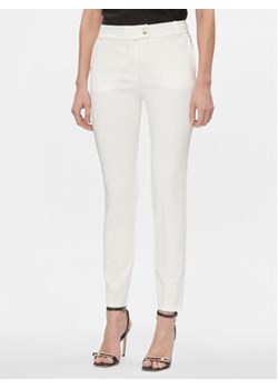 Rinascimento Spodnie materiałowe CFC0117747003 Biały Regular Fit ze sklepu MODIVO w kategorii Spodnie damskie - zdjęcie 168522090
