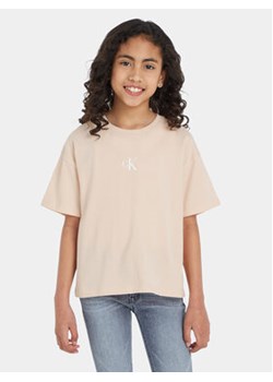 Calvin Klein Jeans T-Shirt IG0IG02136 Różowy Boxy Fit ze sklepu MODIVO w kategorii Bluzki dziewczęce - zdjęcie 168522183