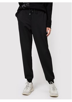 Hugo Spodnie dresowe Heleas 50442419 Czarny Regular Fit ze sklepu MODIVO w kategorii Spodnie damskie - zdjęcie 168524540