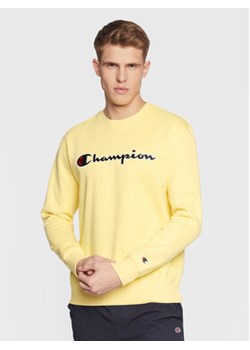 Champion Bluza Embroided Script Logo 217859 Żółty Regular Fit ze sklepu MODIVO w kategorii Bluzy męskie - zdjęcie 168524984