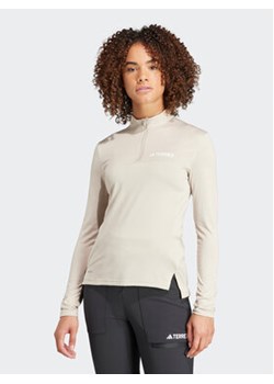 adidas Koszulka techniczna Terrex Multi HZ6265 Beżowy Slim Fit ze sklepu MODIVO w kategorii Bluzki damskie - zdjęcie 168527200