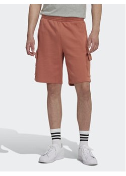 adidas Szorty sportowe Graphic Ozworld HL9255 Pomarańczowy Regular Fit ze sklepu MODIVO w kategorii Spodenki męskie - zdjęcie 168528672