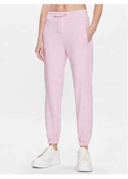 United Colors Of Benetton Spodnie dresowe 31NB3F01X Różowy Regular Fit ze sklepu MODIVO w kategorii Spodnie damskie - zdjęcie 168529434