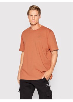 adidas T-Shirt Graphic Ozworld HL9232 Pomarańczowy Relaxed Fit ze sklepu MODIVO w kategorii T-shirty męskie - zdjęcie 168530080