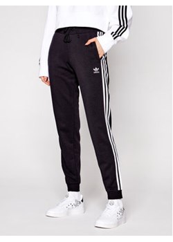 adidas Spodnie dresowe Cuffed GD2255 Czarny Slim Fit ze sklepu MODIVO w kategorii Spodnie damskie - zdjęcie 168530593