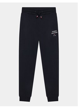 Tommy Hilfiger Spodnie dresowe Logo KB0KB08697 D Granatowy Regular Fit ze sklepu MODIVO w kategorii Spodnie chłopięce - zdjęcie 168531140