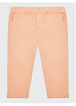 Guess Spodnie materiałowe K3GB04 WFBO0 Pomarańczowy Relaxed Fit ze sklepu MODIVO w kategorii Spodnie dziewczęce - zdjęcie 168535423