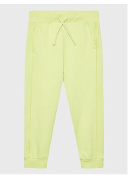 United Colors Of Benetton Spodnie dresowe 3UHRCF02N Żółty Regular Fit ze sklepu MODIVO w kategorii Spodnie dziewczęce - zdjęcie 168535940