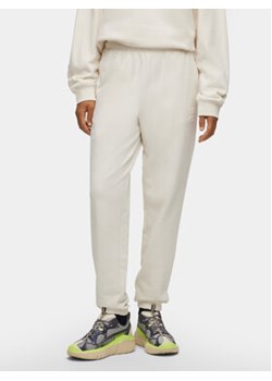 Hugo Spodnie dresowe 50500460 Biały Relaxed Fit ze sklepu MODIVO w kategorii Spodnie damskie - zdjęcie 168536203