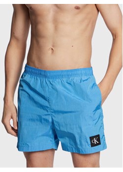 Calvin Klein Swimwear Szorty kąpielowe KM0KM00819 Niebieski Regular Fit ze sklepu MODIVO w kategorii Kąpielówki - zdjęcie 168538420