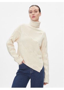 Calvin Klein Sweter Asymetric Modern Cable Sweater K20K206016 Beżowy Regular Fit ze sklepu MODIVO w kategorii Swetry damskie - zdjęcie 168539063