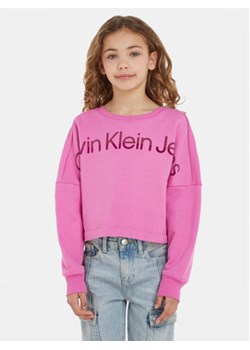 Calvin Klein Jeans Bluza Hero Logo IG0IG02210 Różowy Regular Fit ze sklepu MODIVO w kategorii Bluzy dziewczęce - zdjęcie 168539691