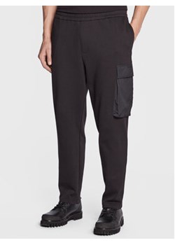 Armani Exchange Spodnie dresowe 3RZPFE ZJXGZ 1200 Czarny Regular Fit ze sklepu MODIVO w kategorii Spodnie męskie - zdjęcie 168541463