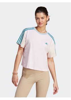 adidas T-Shirt Essentials 3-Stripes IM0364 Różowy Loose Fit ze sklepu MODIVO w kategorii Bluzki damskie - zdjęcie 168541694