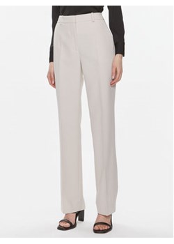 Calvin Klein Spodnie materiałowe Essential K20K206879 Szary Slim Fit ze sklepu MODIVO w kategorii Spodnie damskie - zdjęcie 168541814