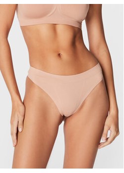 Calvin Klein Underwear Stringi 000QF6611E Beżowy ze sklepu MODIVO w kategorii Majtki damskie - zdjęcie 168545192