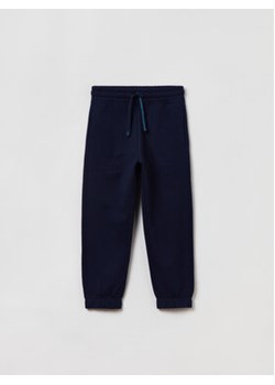 OVS Spodnie dresowe 1757958 Niebieski Regular Fit ze sklepu MODIVO w kategorii Spodnie chłopięce - zdjęcie 168547152