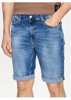 Calvin Klein Jeans Szorty jeansowe J30J322784 Niebieski Slim Fit ze sklepu MODIVO w kategorii Spodenki męskie - zdjęcie 168547684