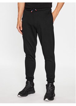 Rossignol Spodnie dresowe Black RLKMP13 Czarny Regular Fit ze sklepu MODIVO w kategorii Spodnie męskie - zdjęcie 168547933