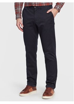 Sisley Spodnie materiałowe 4XRUSF01M Granatowy Regular Fit ze sklepu MODIVO w kategorii Spodnie męskie - zdjęcie 168548012