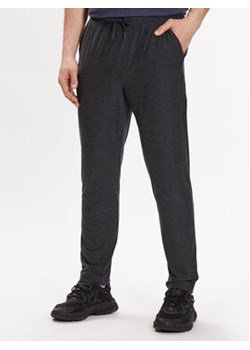 Skechers Spodnie dresowe Ultra Go Lite MPT108 Czarny Regular Fit ze sklepu MODIVO w kategorii Spodnie męskie - zdjęcie 168548182